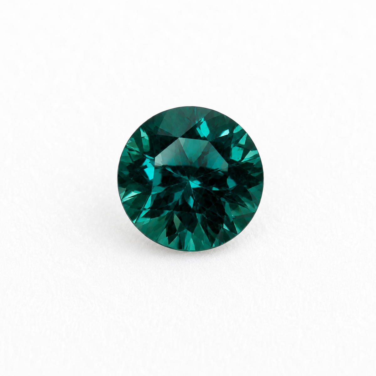 Inky Blue Green Sapphire with Teal Flashes 0.7ct