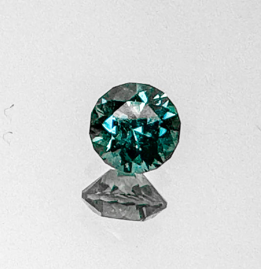 Inky Blue Green Sapphire with Teal Flashes 0.7ct